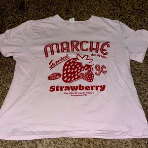 Cute crop with rust stains on the back heavily worn